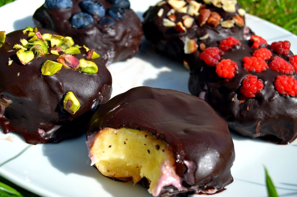 Raspberry Chocolate Doughnut Peaches with one half eaten