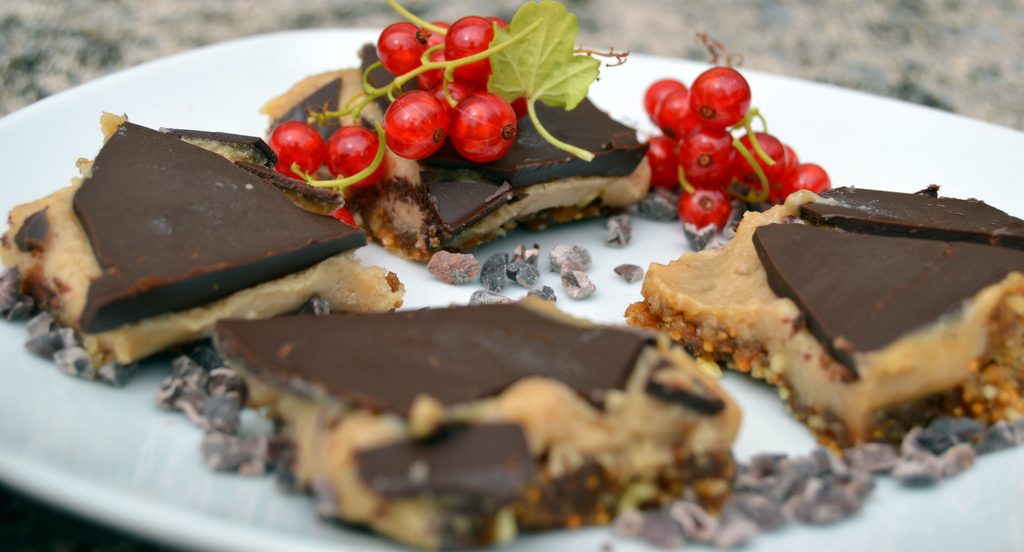 chocolate caramel slice on a plate to eat