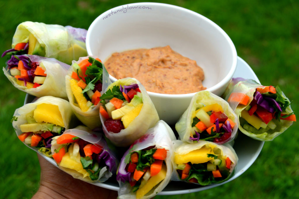 Summer Rolls Healthy Recipe with Spicy Lemon Nut Dips on a plate. These rolls are a great way to load up on healthy fruit and veg.