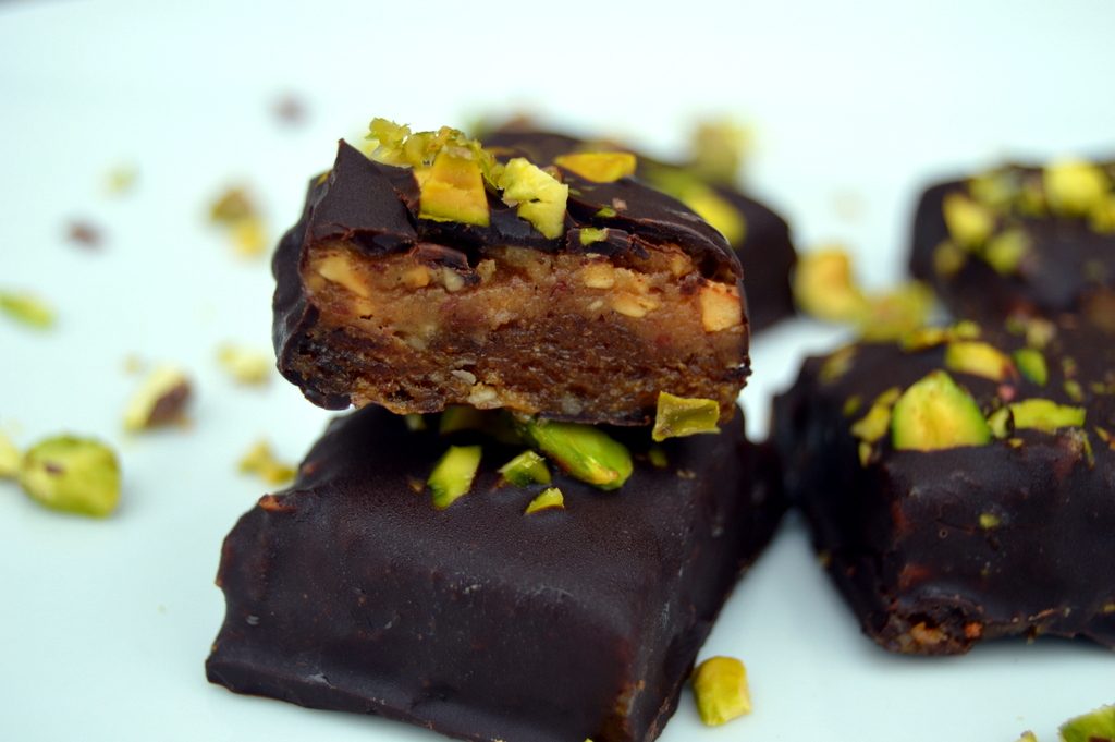 raw salted caramel snickers are made from just a few whole food ingredients and covered with dark chocolate