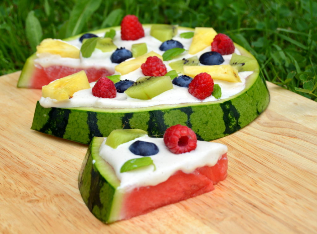 raw fruit pizza with cashew topping