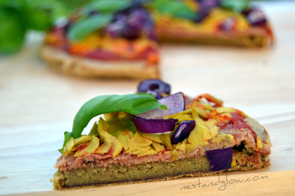 A slice of gluten free quinoa crust pizza