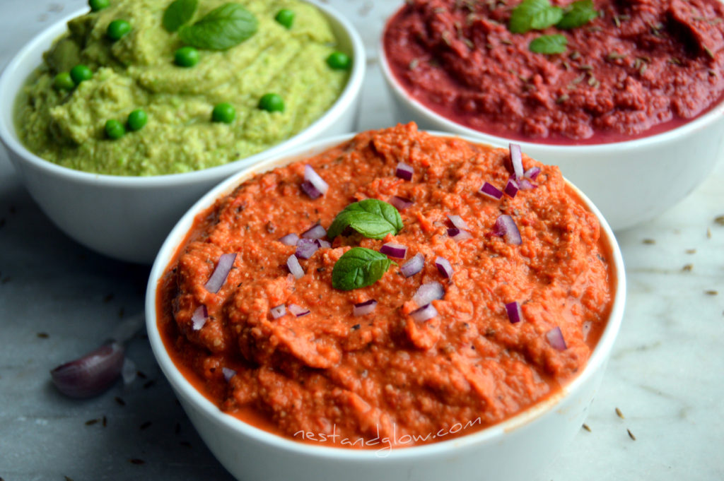 Bowls of colourful hummus and recipe