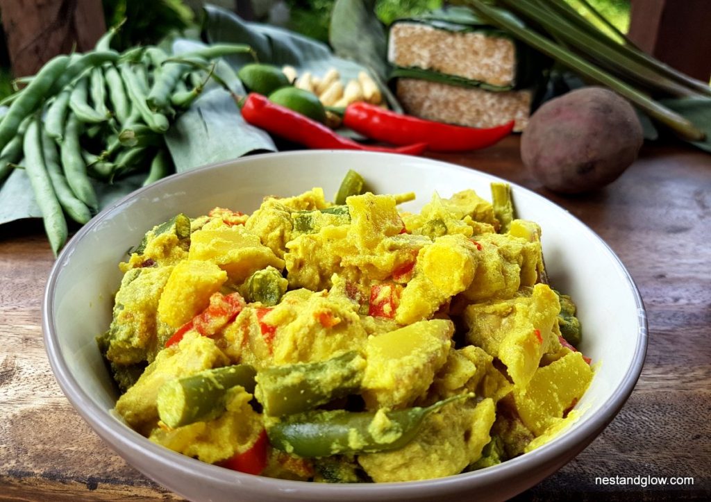 Golden Tempeh Curry with Coconut Sweet Potato Nest and Glow