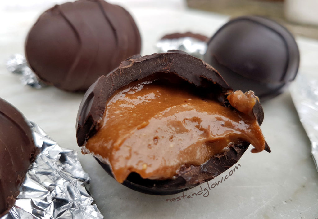 Mocha Coffee Cream Egg Half eaten with vegan caramel oozing out