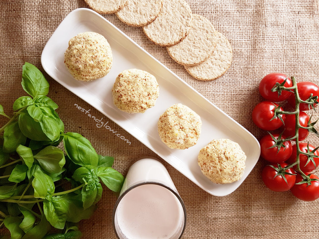 Almond pulp cheese on a platter makes a perfect cracker topping for a cheesy nutty taste. Full of goodness and avoids any waste.