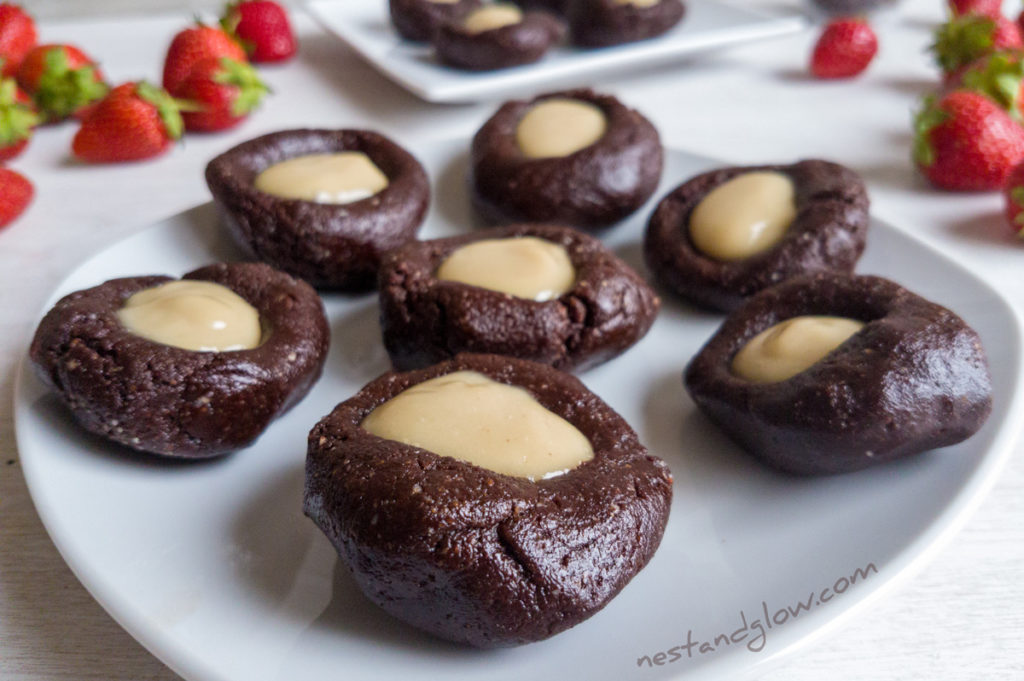 A plate of Raw Chocolate Cashew Thumbprints