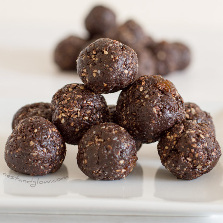 a stack of raw chocolate halva sesame truffles