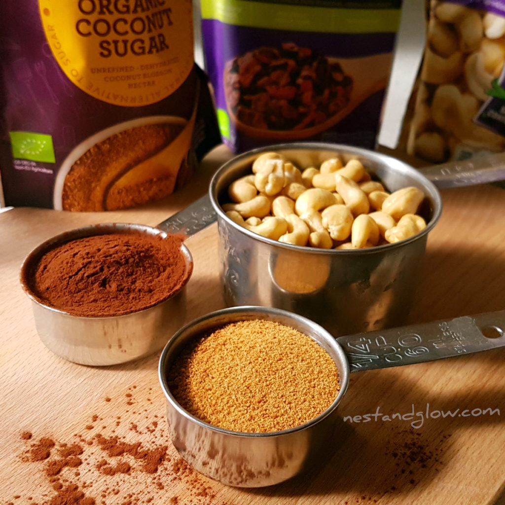 The three ingredients for cacao dusted cashew nuts - cacao, coconut sugar and cashew nuts