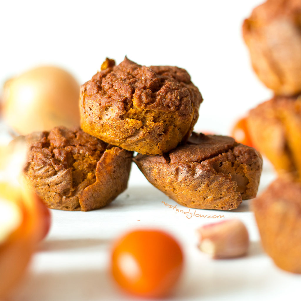 A stack of Quinoa Brown Rice Sundried Tomato savoury Muffins. Great tasting vegan quinoa muffins from sundried tomatoes and smoked paprika