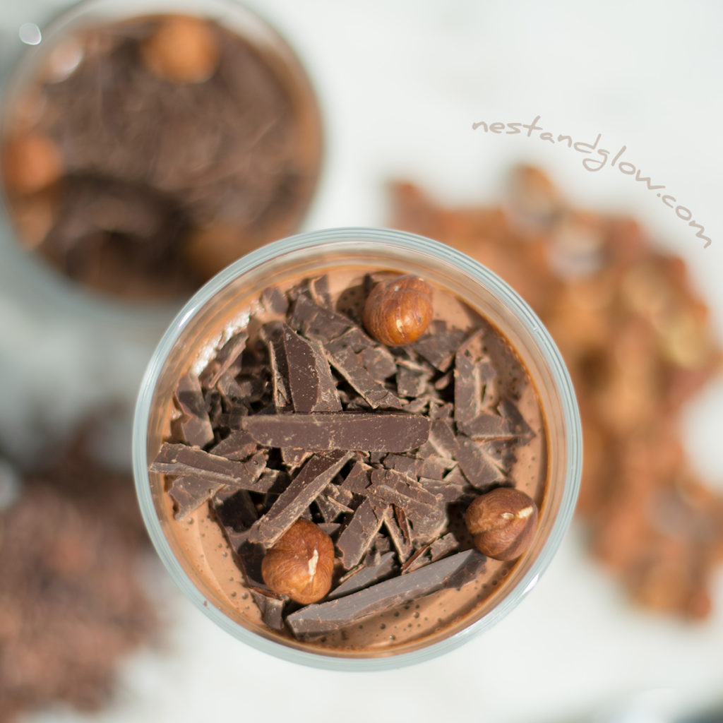 Chocolate coconut nutella mousse topped with grated chocolate and hazelnuts