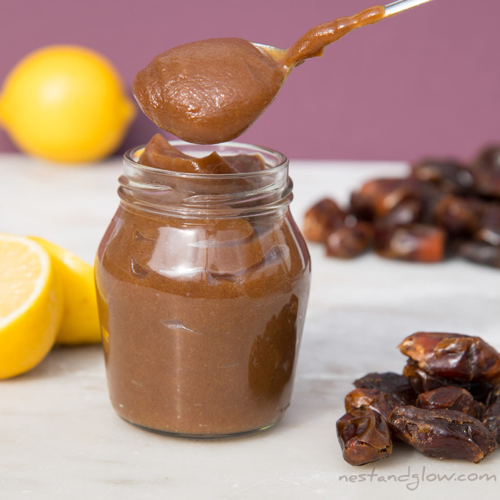 natural sweetener date syrup on a spoon