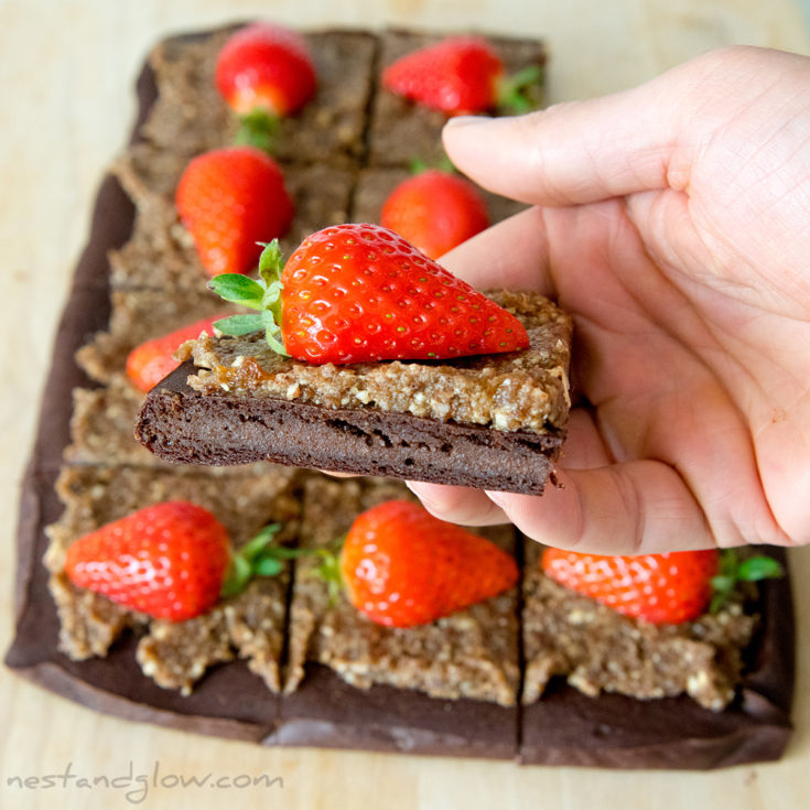 quinoa chocolate brownie easy and healthy gluten free recipe. suitable for vegan and wheat free diets and topped with a strawberry