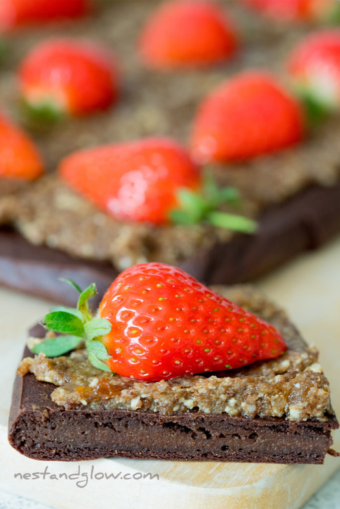 Oil free quinoa brownie thats topped with berries. As the quinoa is sprouted it's suitable for a paleo diet and called a paleo brownie.