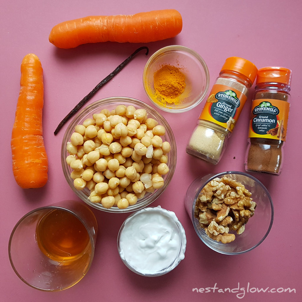 ingredient to make carrot cake hummus are carrot, coconut cream, walnuts, nutmeg, allspice, turmeric, cinnamon, sesame seeds, vanilla and sweetener. The walnuts can be replaced with pumpkin seeds or peacan nuts