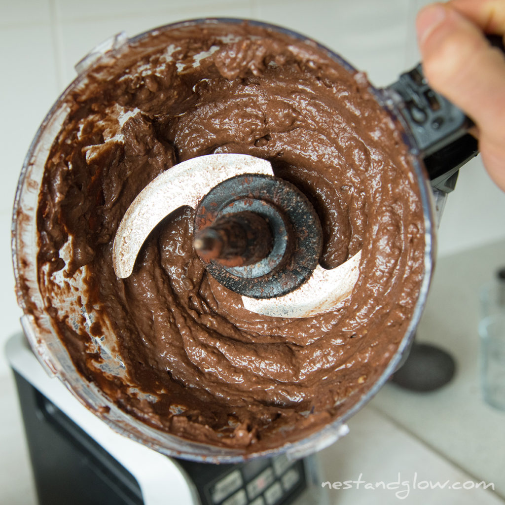 chocolate avocado hummus just blended in a food processor. it takes just 5 minutes to make this healthy sweet hummus