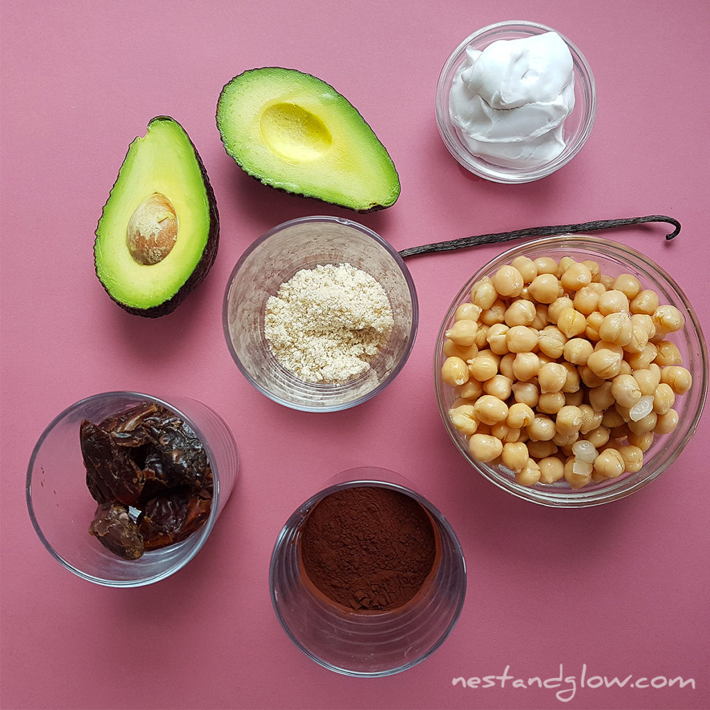 chocolate avocado hummus ingredients are chickpeas, sesame seeds, vanilla, avocado, coconut cream, dates and cocoa