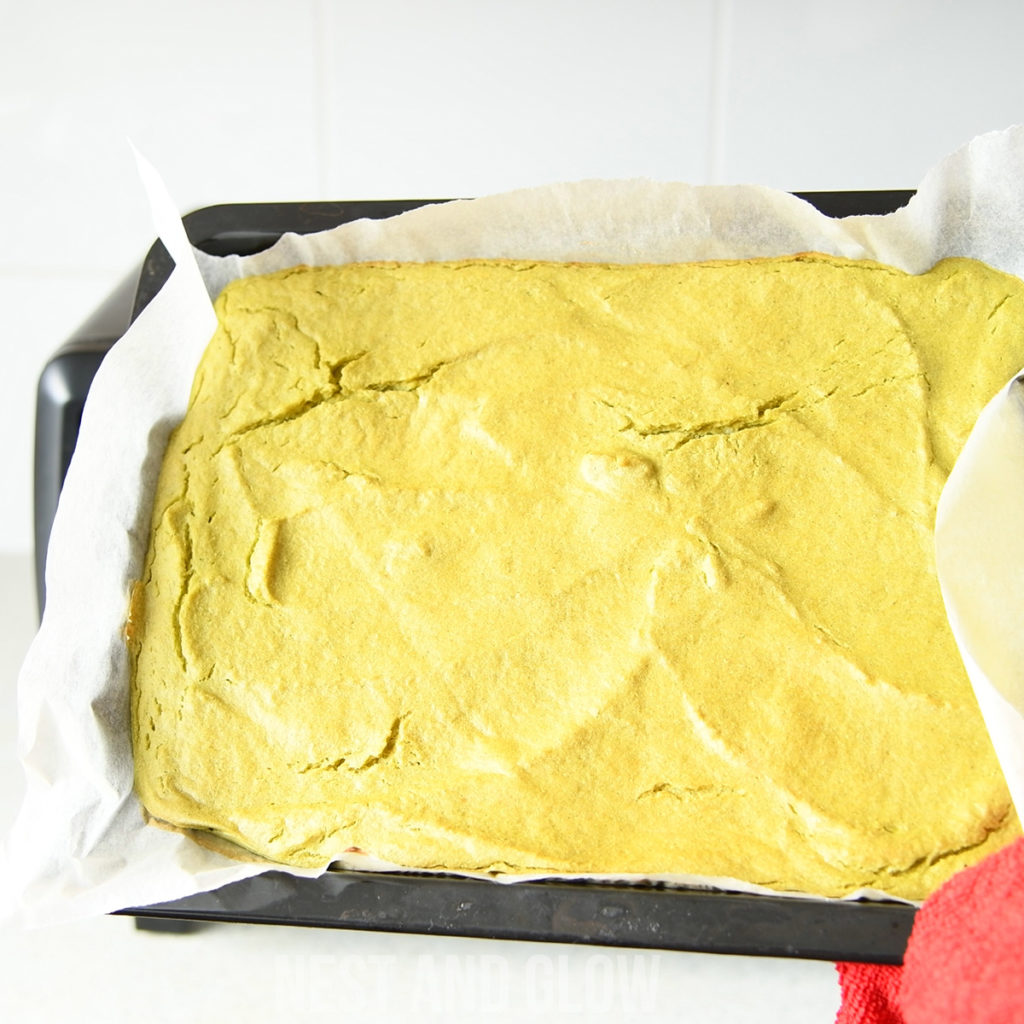 broccoli quinoa bread straight out of the oven. using non stick paper to stop the gluten free bread sticking to the bottom.