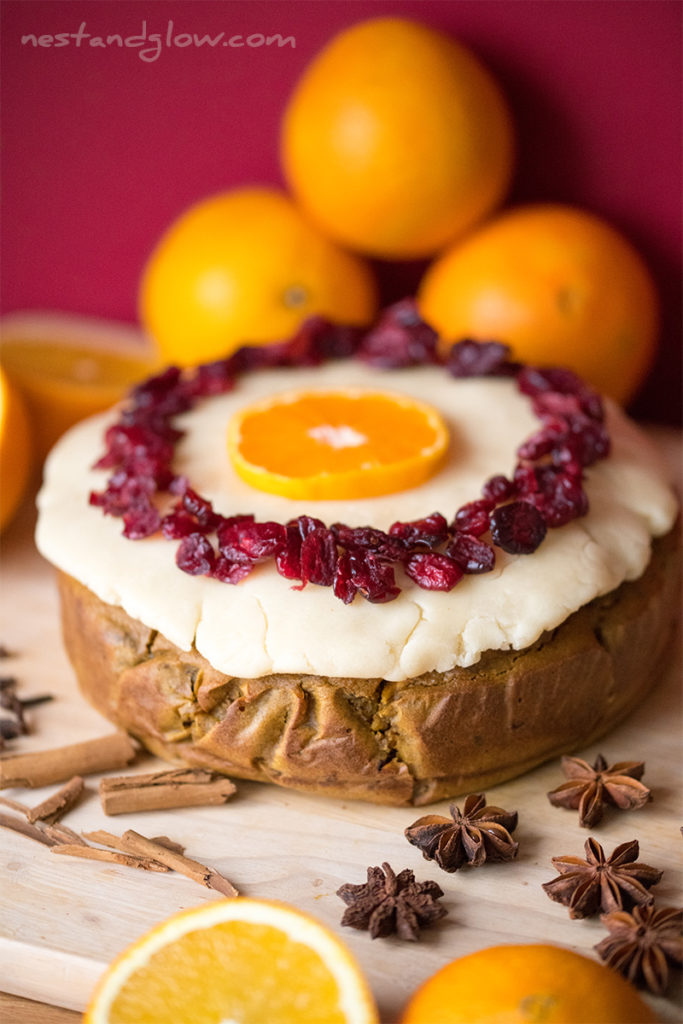 healthy christmas cake made from quinoa and free of flour, sugar, eggs and gluten. Full of nutrition and topped with raw marzipan