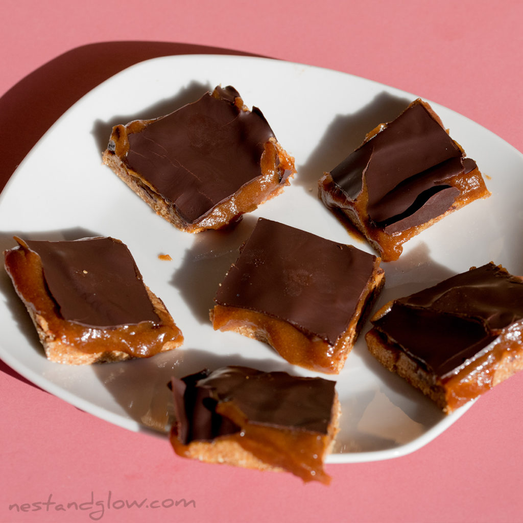 a plate of healthy 3 ingredient date shortbread caramel slices. Super easy recipe that's full of goodness