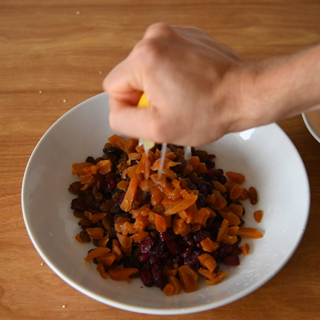 the fruit for this healthy gluten free and vegan cake is soaked in lemon and clementine juice. The dried fruit used is sultanas, apricots and cranberries.